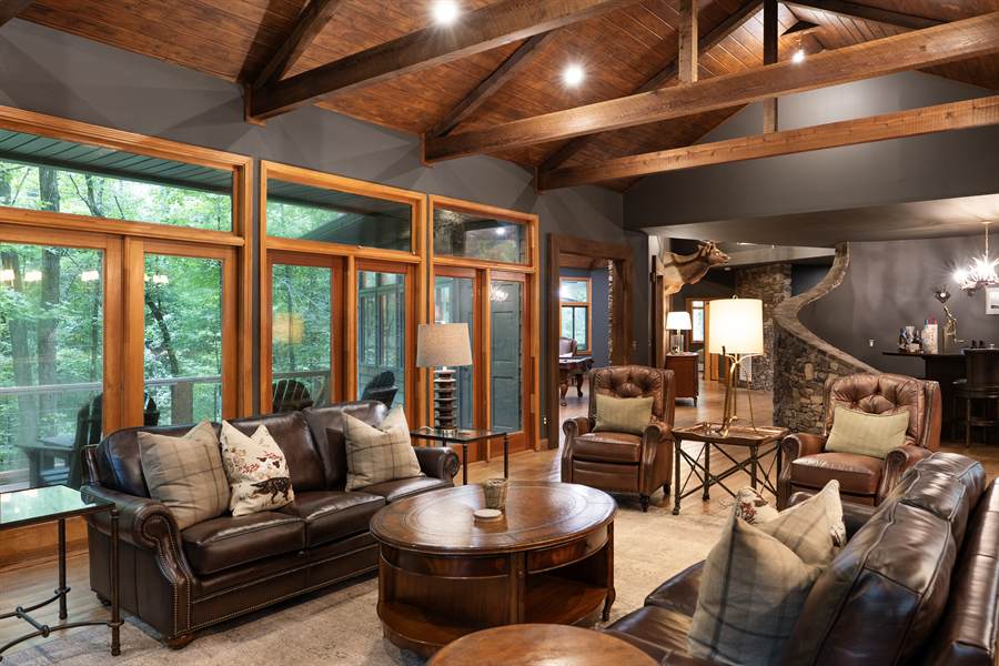 Leather sofas and armchairs in the lodge sitting room